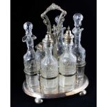 Victorian electro-plated cruet stand, the base of plain polished oval form supported on four