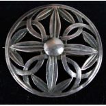 Sibyl Dunlop - hallmarked circular brooch of open work stylised flower head design, stamped "SD" and