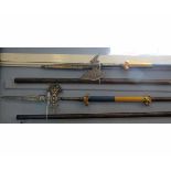 Set of four reproduction wooden and steel topped pikes, from the Howard family of Corby Castle,