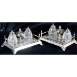 Pair of late Victorian electro-plated ink stands of rectangular form, each surmounted by a