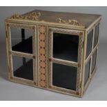19th Century painted wood curio cabinet of rectangular shape with glass panelled sides and two front