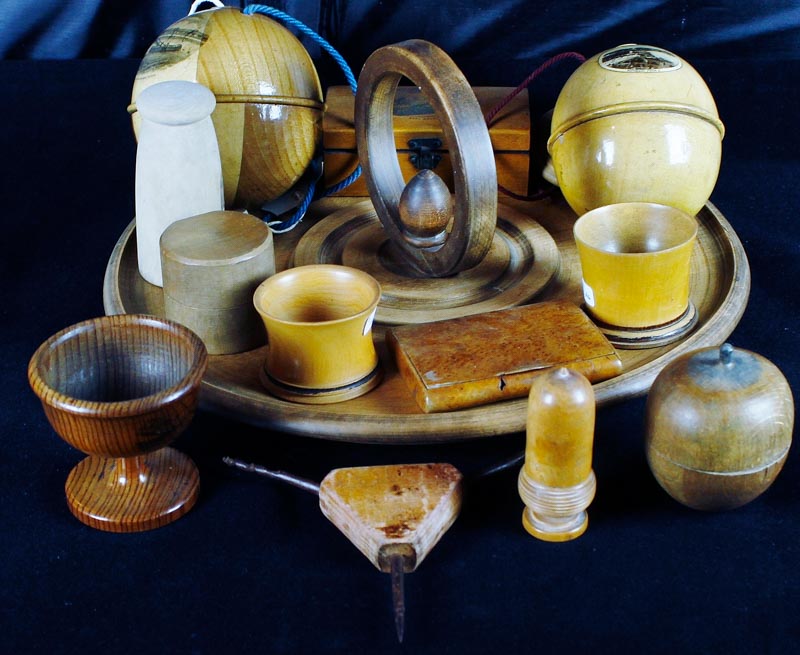 Collection of treen and Mauchline wares including a turned circular dish with circular carrying