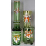 A group of four items of Bohemian glassware, viz: a tall cylindrical green glass vase with knopped