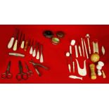 Of sewing interest - a collection of 18 assorted bone/ivory sewing pieces, three metal cased tape