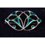 Charles Horner hallmarked silver brooch of pierced oval design with detail in blue/green enamels,