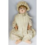 English bisque headed girl doll stamped "Regina D P 56-12", further stamped "British Made",