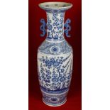 20th Century Dutch, Chinese style tall baluster vase underglaze decorated in blue with flowers and