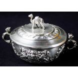 Late Victorian small circular silver lidded bowl, the base heavily embossed with two Coats of Arms