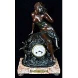 Late 19th Century Art Nouveau style striking mantel clock in spelter with mottled marble base,