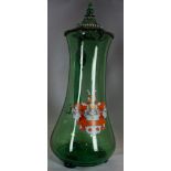 Bohemian green glass lidded wine jug of plain design and baluster form, supported on three tab feet,
