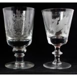 Two 20th Century commemorative glass Rummers, one with inverted bell-shaped bowl, knopped stem and