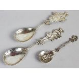 Pair of late 19th century import hallmarked silver serving spoons, Dutch made, the handles cast as