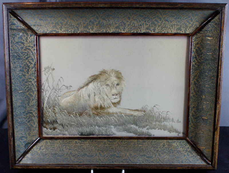 Late 19th Century Japanese freehand silk work picture of a recumbent lion in natural habitat,