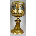 Fine Bohemian enamelled and gilt goblet of yellow tinted glass, Enamelled on one side with the