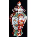 19th Century Japanese Imari baluster vase of waisted octagonal section, brightly decorated with