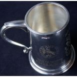 Elizabeth II silver tankard of tapering cylindrical form with spreading circular foot and hollow