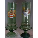 Pair of Bohemian green tinted glass vases of cylindrical and baluster form, each enamelled with a