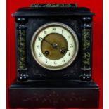 Late Victorian slate cased striking mantel clock, having Arabic numbers to a cream enamelled chapter