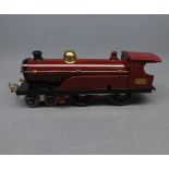 Hornby O gauge clockwork locomotive of nut and bolt construction, features brass number plate 2711