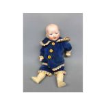 Unsigned small boy porcelain headed doll, in blue outfit, 11 high