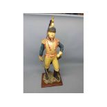 Shudehill brightly painted large model of a standing infantryman with sword lowered, 20 high