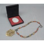 Small hardstone Chinese pendant, decorated with dragon, together with a further necklace