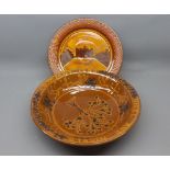 Modern slipware dish, decorated with scene of Blickling Hall and a further modern slipware bowl