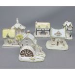 Collection of six Coalport model cottages