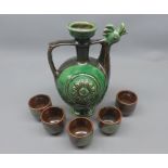 20th century Russian pottery decanter and five small cups