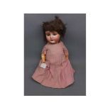 Vintage porcelain headed doll, with jointed body marked Germany 21 R5A to back of head