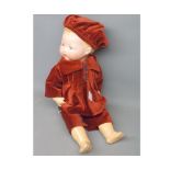 Armand Marseille porcelain headed doll, in red outfit