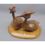 Albert King, carved walnut model of crested grebes