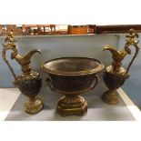 Late 19th or early 20th century unusual garniture, in bronze and gilt metal, comprising an elaborate