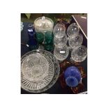 Three various glass bowls, various other coloured glassware and a clear biscuit barrel; together