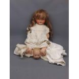 Heubach Koppelsdorf porcelain headed doll, together with a further small porcelain doll s head