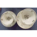 Six 18th or early 19th century black and white decorated tea bowls, and accompanying saucers, plus