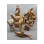 Collection of nine various carved Fijian and other hardwood models: sea horses, birds, dolphin etc