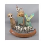 Mixed Lot: composition model of a bush-baby on plinth base, together with further decorated model of
