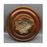 Unusual inset brass and wood wall plaque, approx 11" diameter