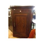 18th century single door wall mounted corner cupboard, with inlaid shield detail to door, with three