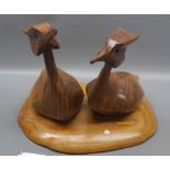 Albert King, carved walnut model of crested grebes