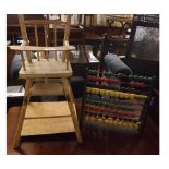 Doll's folding high chair together with a vintage abacus (2)
