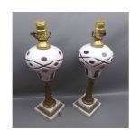 Pair of 19th century oil lamp bases with later electrical conversion, the bodies with opaque and