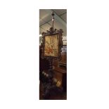 19th century Continental oak pole screen, set with tapestry panel on a heavily carved support with