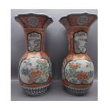 Pair of 20th century Japanese vases of baluster form, decorated with panels of various birds amongst