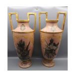 Pair of large Victorian double handled vases decorated with various panels of game and flowers,