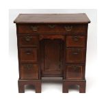 Queen Anne style oak/walnut small desk, the boxwood strung top over a full width frieze drawer