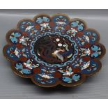 Late 19th or early 20th century Japanese cloisonn dish of frilled form, decorated with central bird,