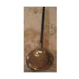 Victorian copper bed warming pan with turned wooden handle