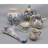 Mixed Lot: Quimper and other continental potteries, to include various teapots, wall pockets, vase